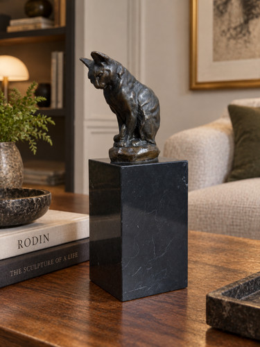 Bronze sculpture seated - of, a
