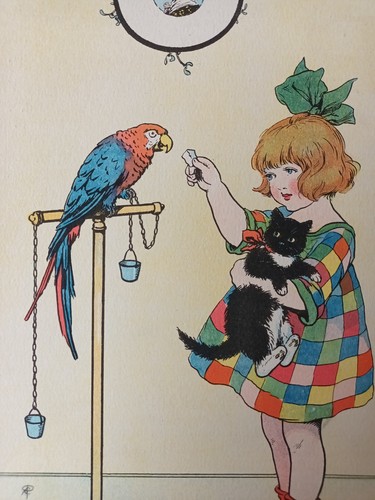 Girl holding her cat whilst - girl,