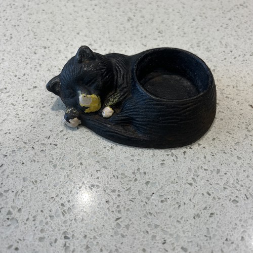Antique cast iron sleeping cat - cast,
